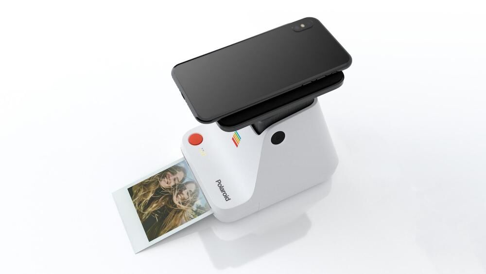 Illustratie voor: Eindelijk! Met dit apparaat maak je polaroid foto’s vanaf je smartphone