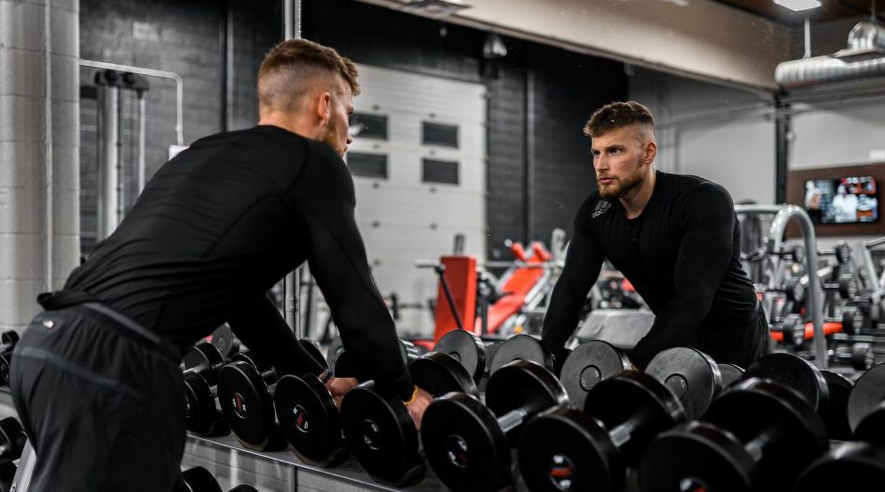 oefeningen dumbbells borst