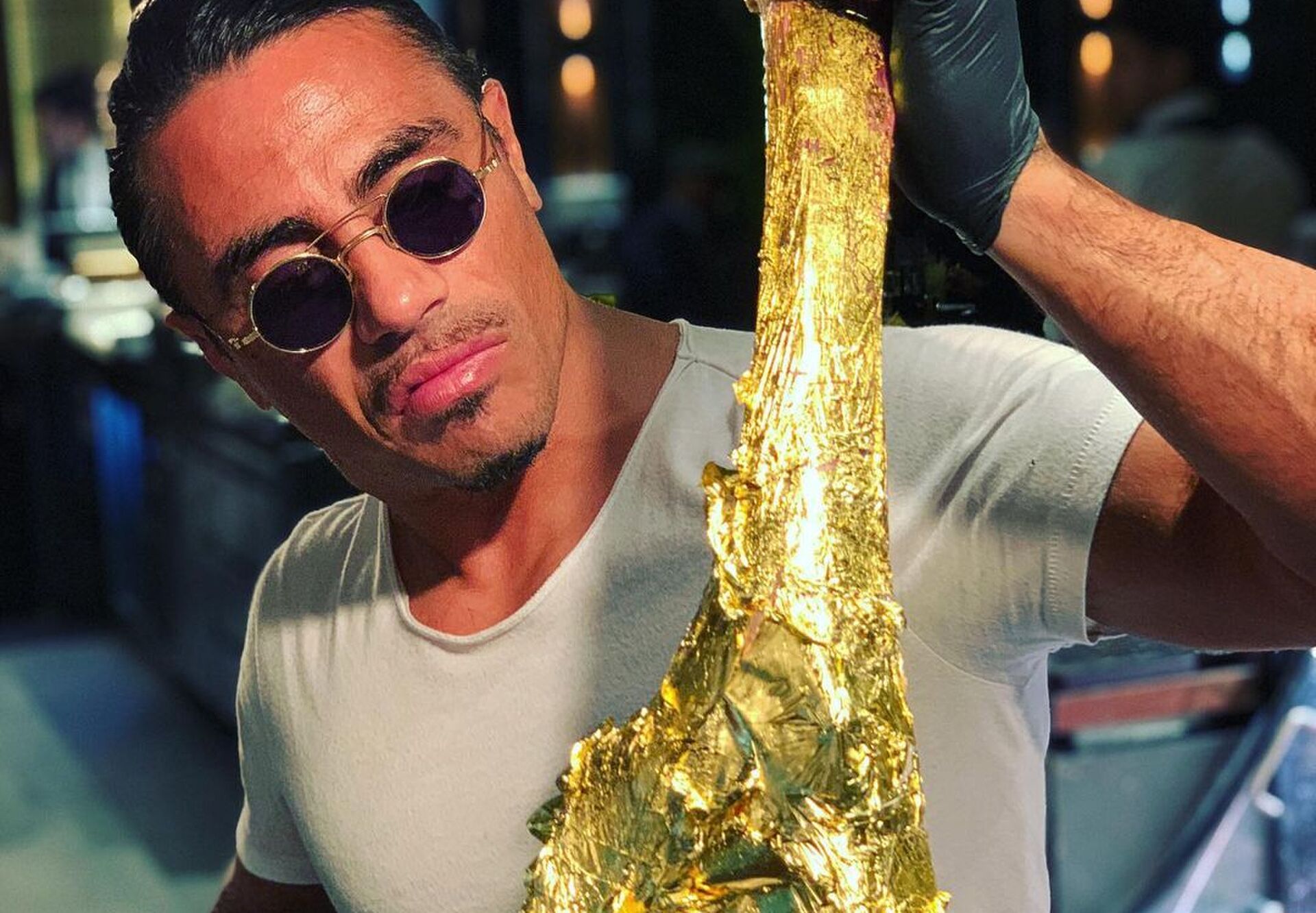 Golden Tomahawk steak Salt Bae